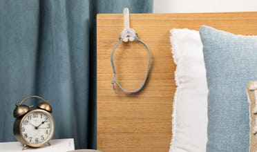 AirFit P10 hanging from headboard