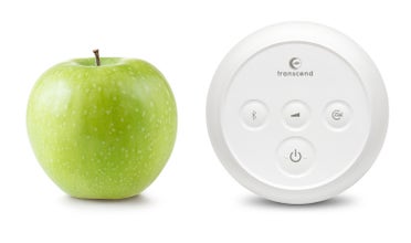 Transcend micro sitting next to apple for size comparison
